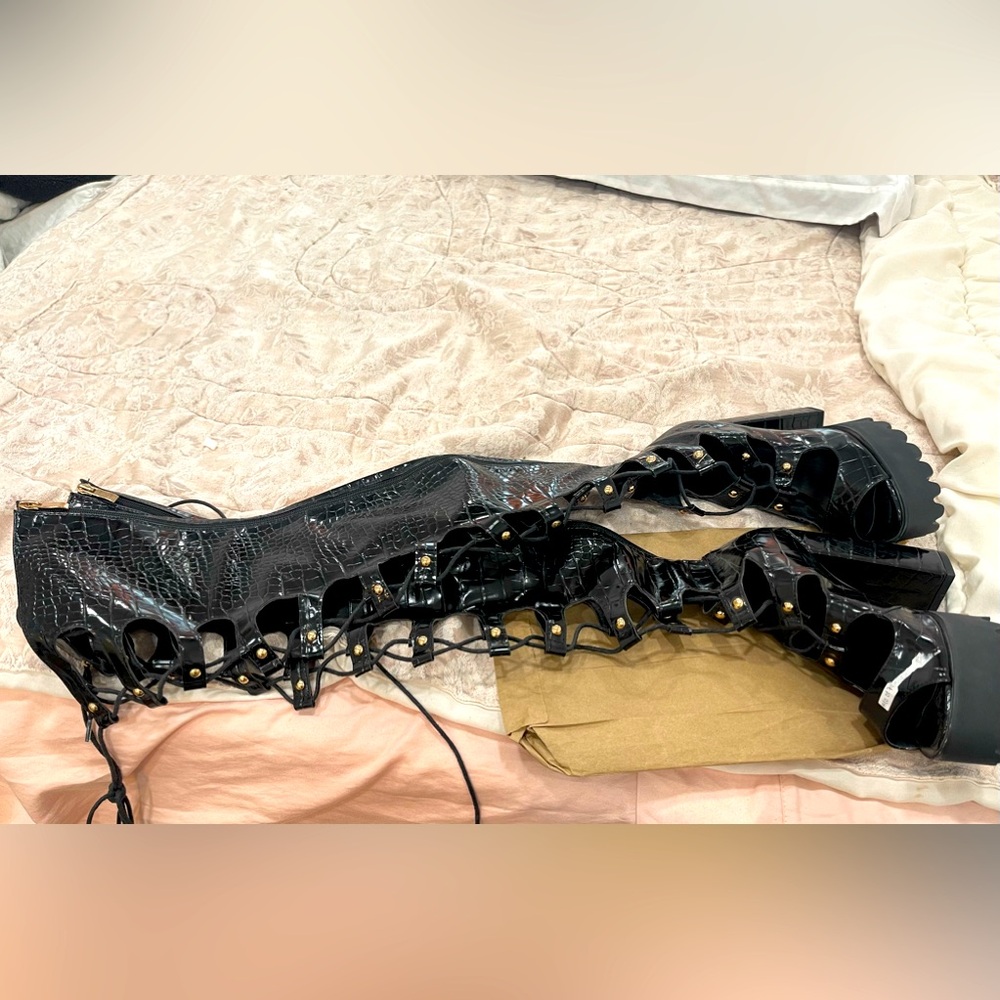 Boots over the knee. New.